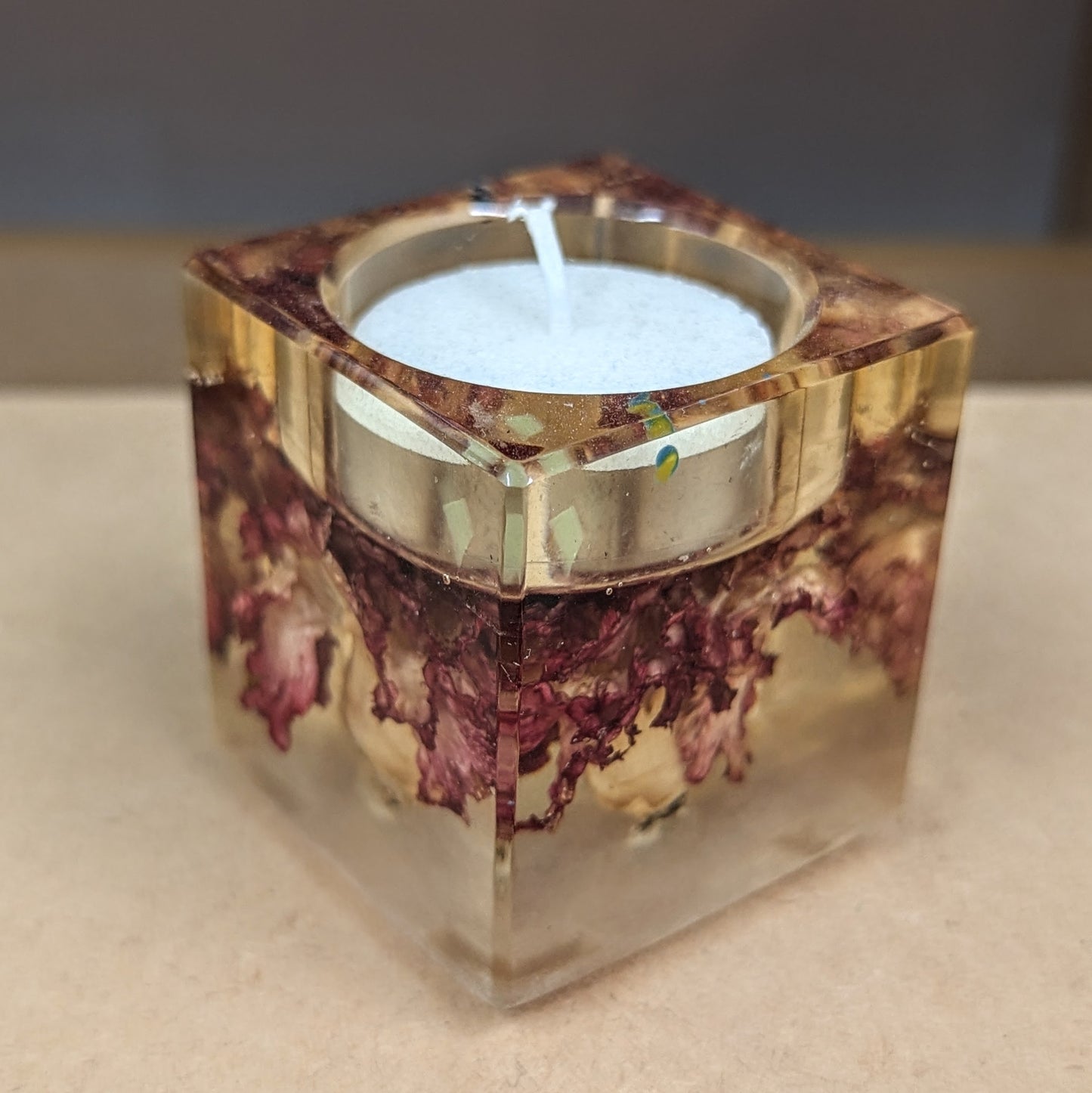 Infused carnation resin candle holder