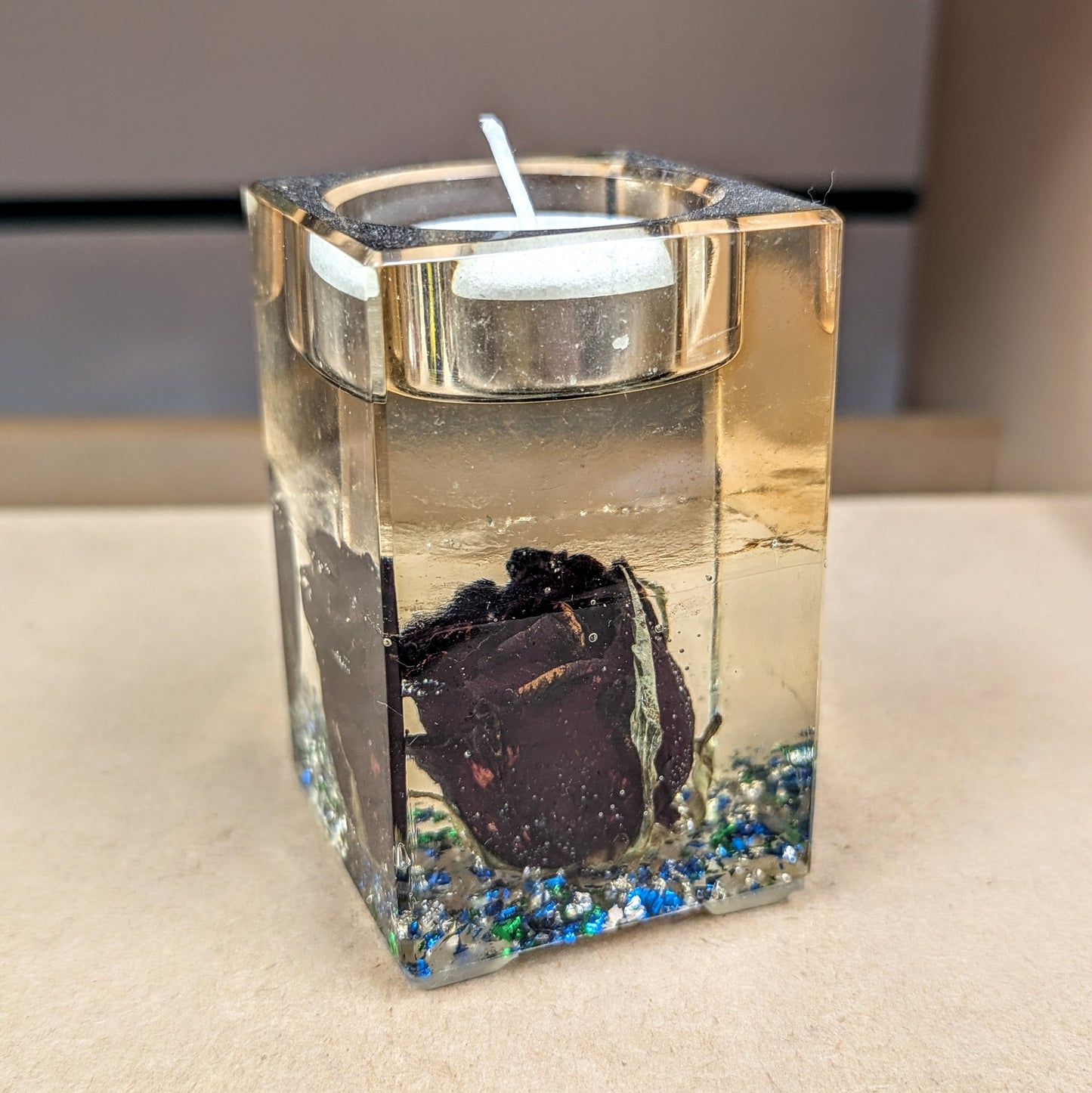 Red rose encased resin candle holder