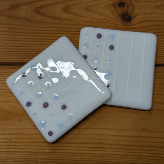 Muted polka dot white coasters